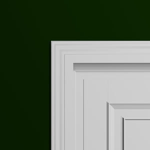 View of a room featuring the M9073A Primed White Pine Wood Casing Moulding installed, measuring 11/16 in x 3-1/2 in x 17 ft, highlighting an elegant and clean finish, ideal for enhancing the aesthetics of any space.