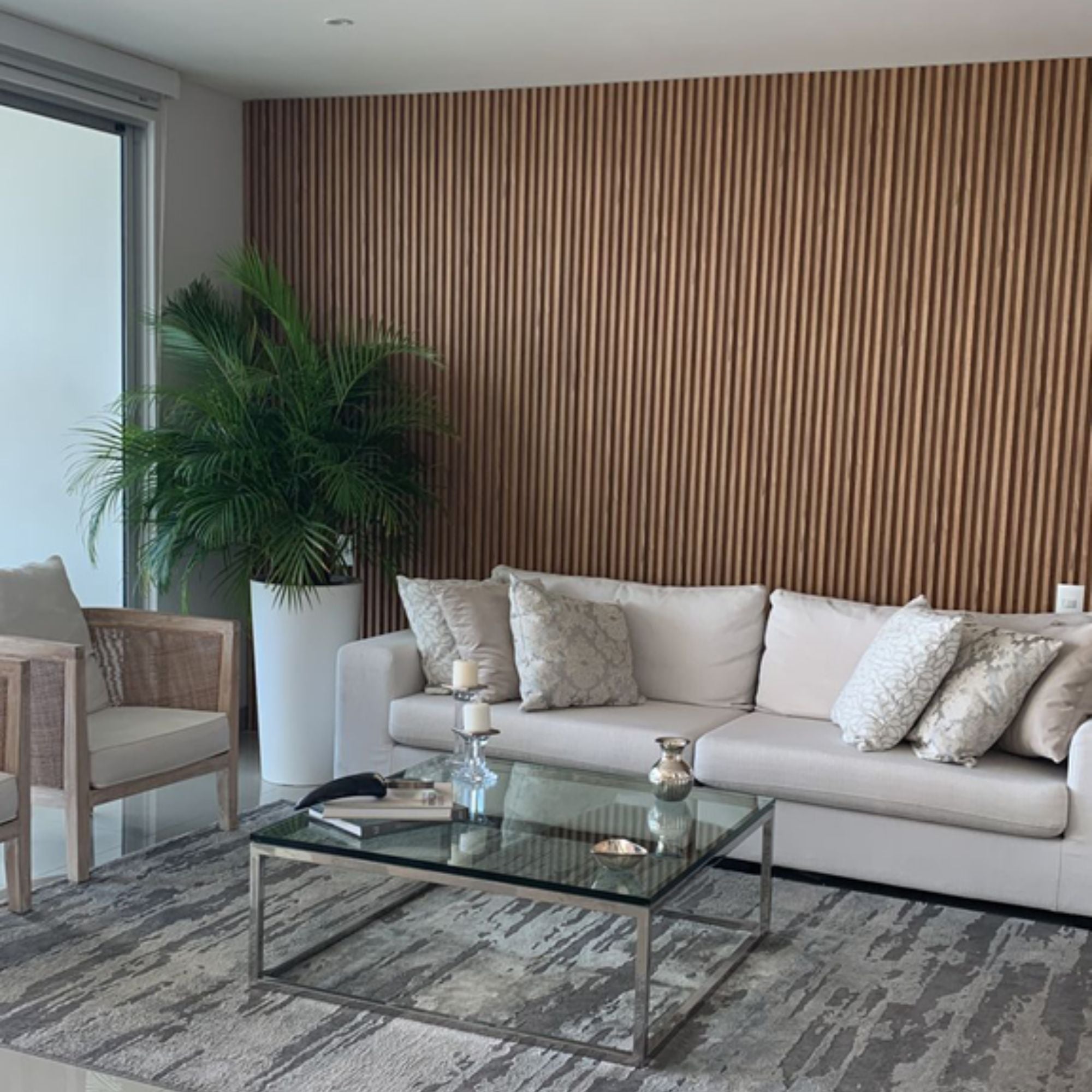 A beautifully styled room featuring the Eucalyptus Decorative Wall Panel - WPCBancal, adding a sleek, modern aesthetic with its elegant finish and seamless installation on the walls.