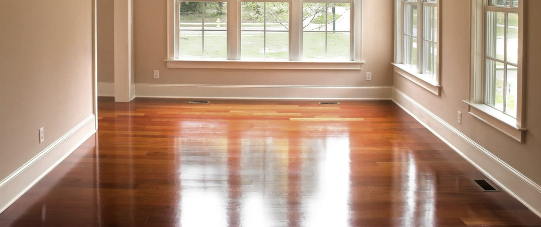 Elegant white baseboard in a bright room with cream walls.