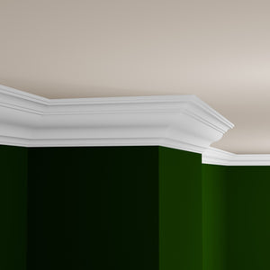 View of a room featuring the M9726A Primed White Pine Wood Crown Moulding installed, measuring 11/16 in x 6-1/4 in x 16 ft, highlighting an elegant and clean finish, ideal for enhancing the aesthetics of any space.