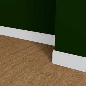 View of a room featuring the MM618C Primed White MDF Baseboard Moulding installed, measuring 19/32 in x 7-1/4 in x 16 ft, highlighting an elegant and clean finish, ideal for enhancing the aesthetics of any space.