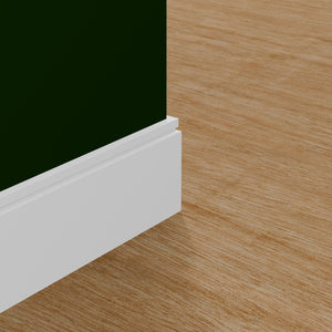 View of a room featuring the MM618C Primed White MDF Baseboard Moulding installed, measuring 19/32 in x 7-1/4 in x 16 ft, highlighting an elegant and clean finish, ideal for enhancing the aesthetics of any space.