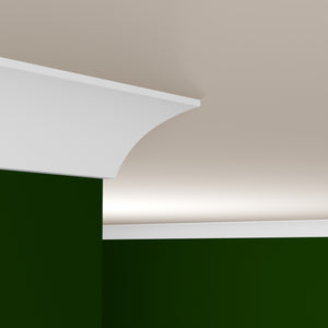 View of a room featuring the M9081C Primed White MDF Crown Moulding installed, measuring 1 in x 7 in x 16 ft, highlighting an elegant and clean finish, ideal for enhancing the aesthetics of any space.