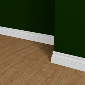 View of a room featuring the M8412A Primed White MDF-UL Baseboard Moulding installed, measuring 9/16 in x 4-1/4 in x 16 ft, highlighting an elegant and clean finish, ideal for enhancing the aesthetics of any space.