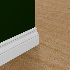View of a room featuring the M8412A Primed White MDF-UL Baseboard Moulding installed, measuring 9/16 in x 4-1/4 in x 16 ft, highlighting an elegant and clean finish, ideal for enhancing the aesthetics of any space.