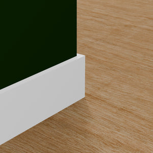 View of a room featuring the L1X6F Primed White MDF Finished Boards Moulding installed, measuring 9/16 in x 5-1/2 in x 16 ft, highlighting an elegant and clean finish, ideal for enhancing the aesthetics of any space.