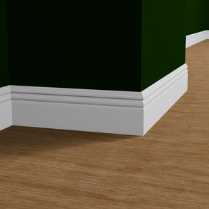 View of a room featuring the M8744A Primed White MDF-UL Baseboard Moulding installed, measuring 9/16 in x 5-1/4 in x 16 ft, highlighting an elegant and clean finish, ideal for enhancing the aesthetics of any space.